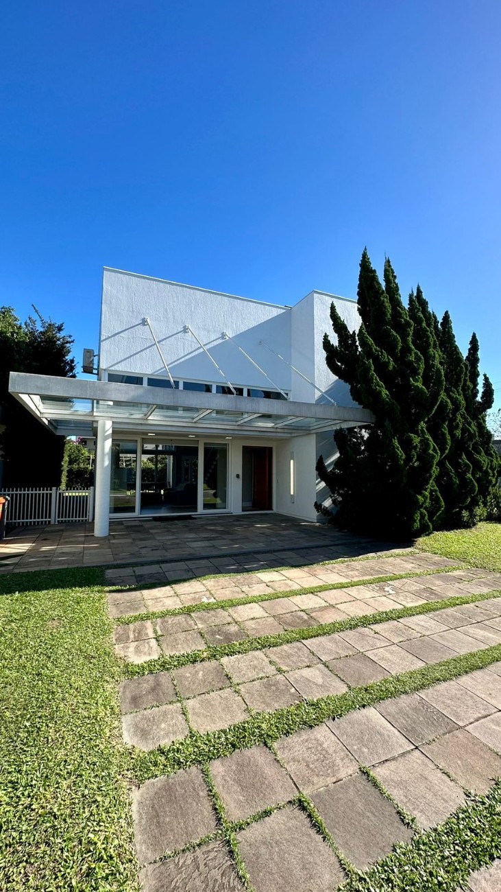 Imagem do imóvel Casa em condomínio 4 dormitórios para aluguel, Capão Da Canoa em Capão Da Canoa referência 304573