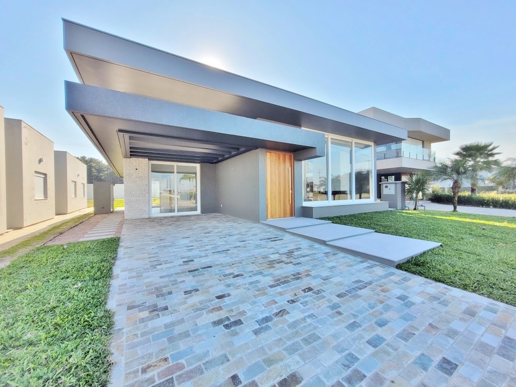 Imagem do imóvel Casa em condomínio 4 dormitórios para aluguel, Capão Novo em Capão Da Canoa referência 305160