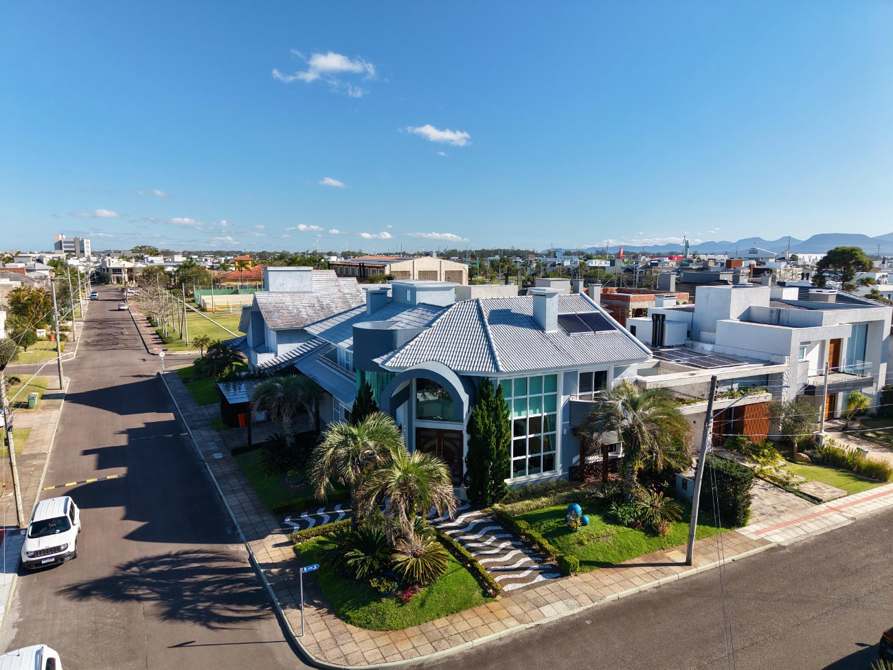 Imagem do imóvel Casa em condomínio 4 dormitórios para aluguel, Zona Nova em Capão Da Canoa referência 307431